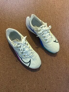 Nike White Trainers with Black Swoosh and Rainbow Midsole